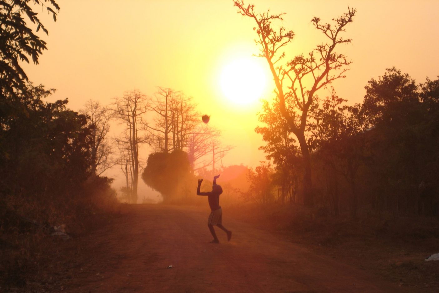 Child playing with a ball in rural Tanzania (Photo: AdobeStock)