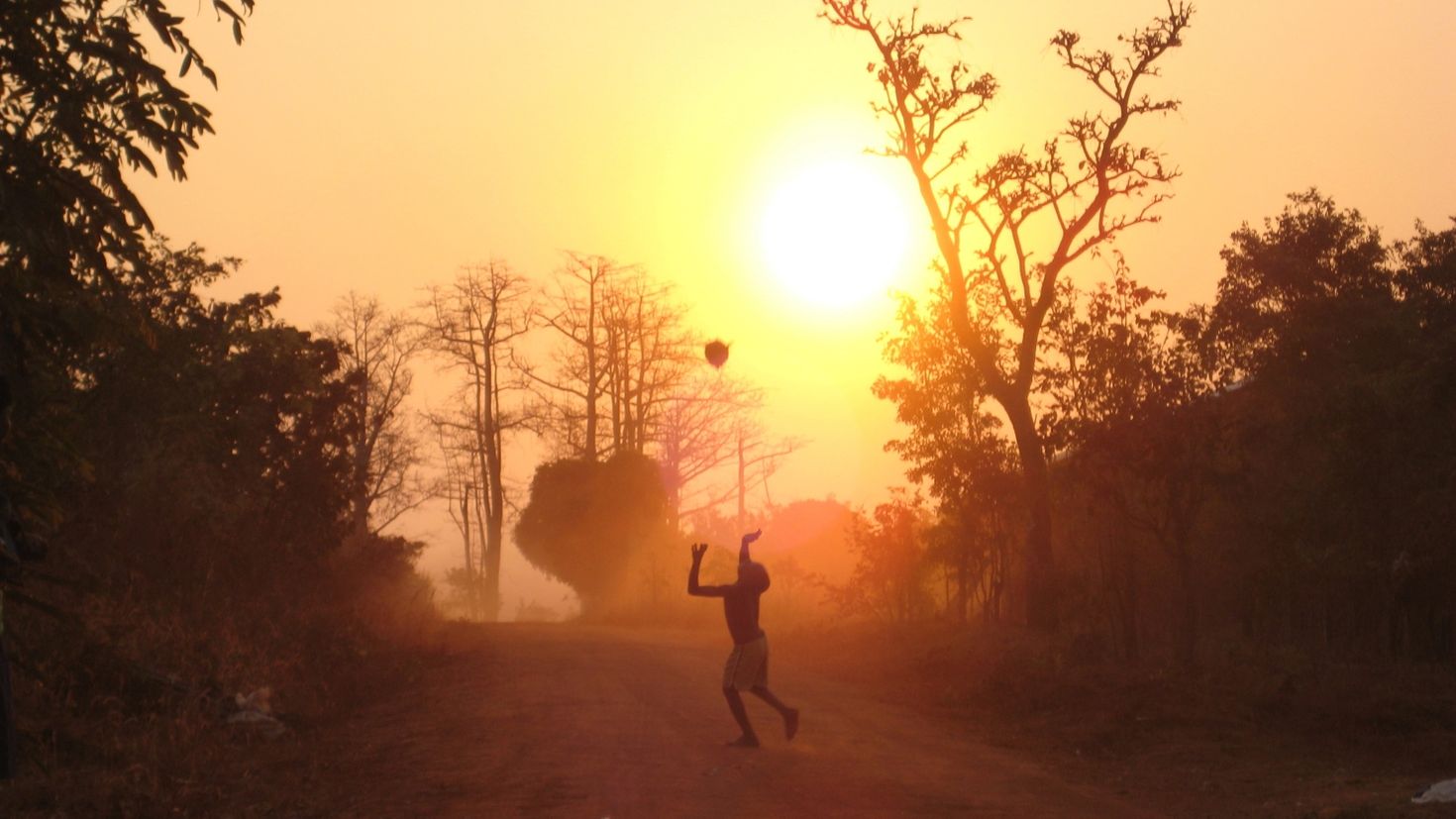 Child playing with a ball in rural Tanzania (Photo: AdobeStock)
