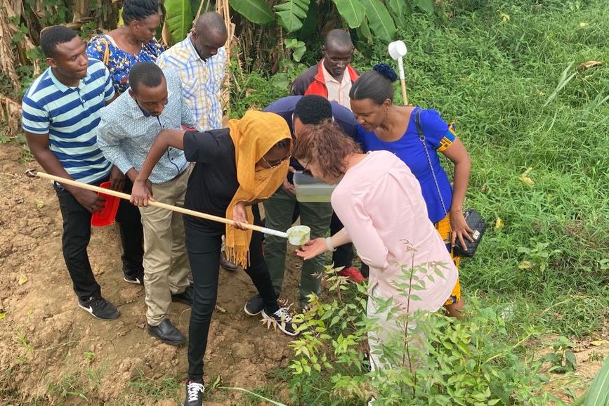 Searching for mosquito larvae in Tanga Region. Photo: Christian Lengeler
