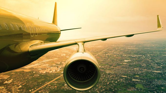 passenger jet plane flyin above cloud scape use for aircraft transportation and traveling business background