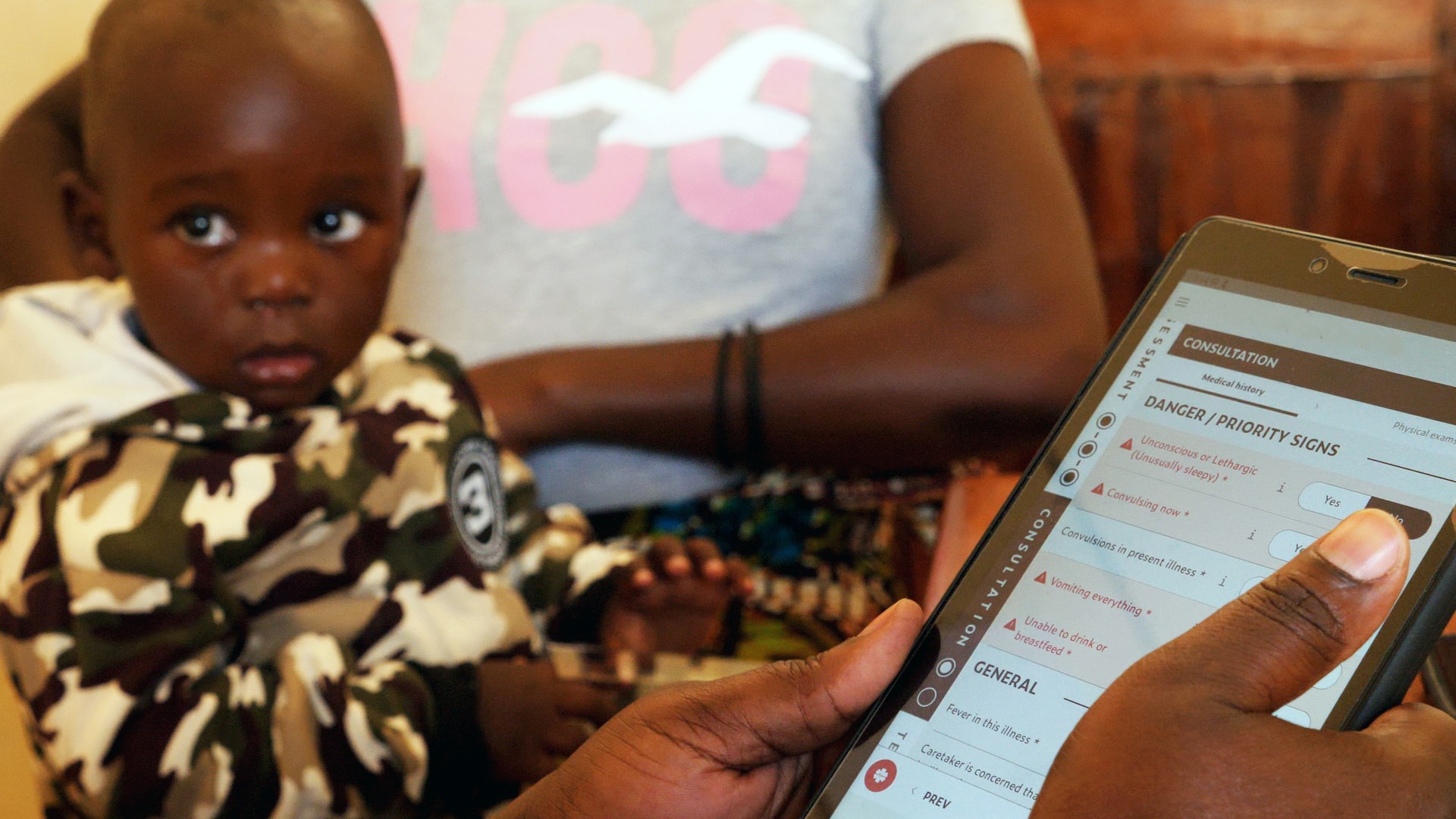 Clinical decision support systems guide health personnel step-by-step through a consultation on a tablet.