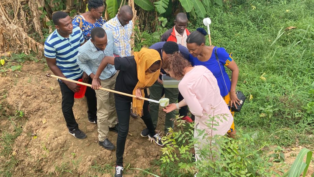 Searching for mosquito larvae in Tanga Region. Photo: Christian Lengeler