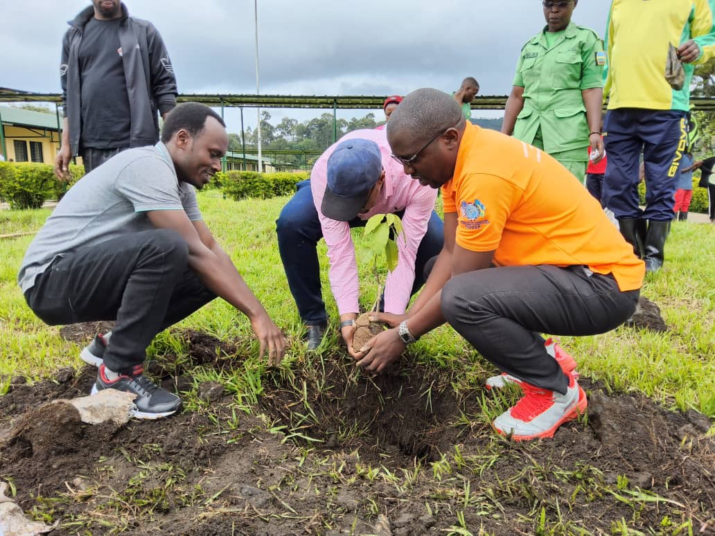 Planting a tree during the environmental protection campaign. (Photo: Deo Ngoga Kalisa)